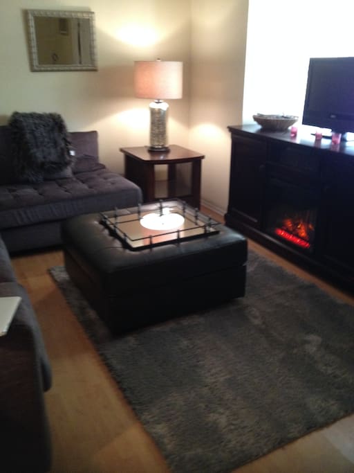 livingroom-complete with a gas fireplace and netflix:) the couch is super comfy.