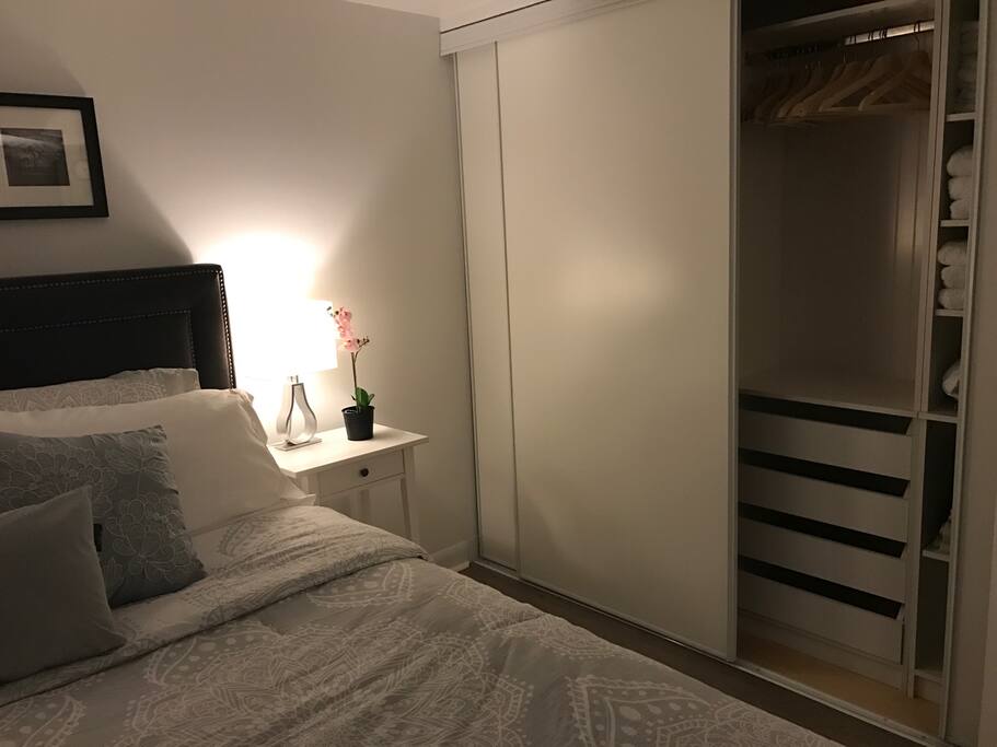 Closet inside the bedroom has drawers and hangers for you to organize your wardrobe nicely and easily.