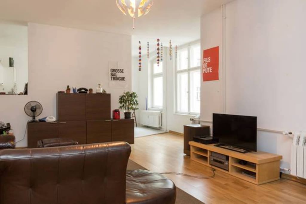 Large living room with access to kitchen