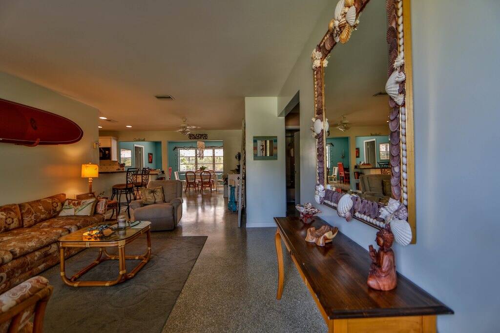Welcome home. Kick off your shoes and and step in to your south Florida retreat. You will love the the cooling feel of the Terrazzo flooring, a Florida vavorite