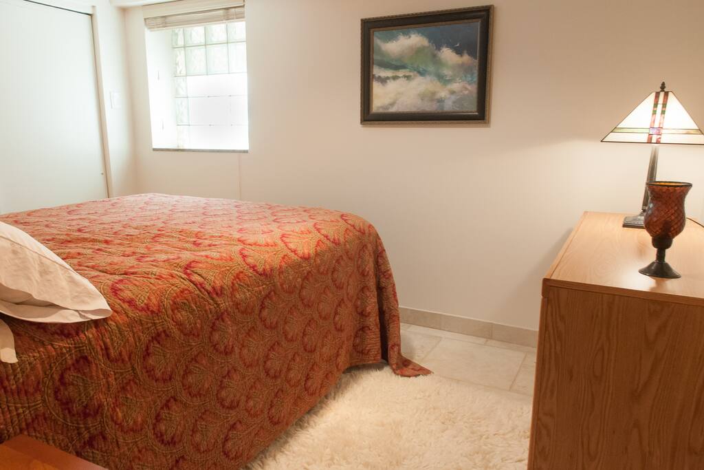 Freshly remodeled room for rent with leather headboard and comfortable queen mattress