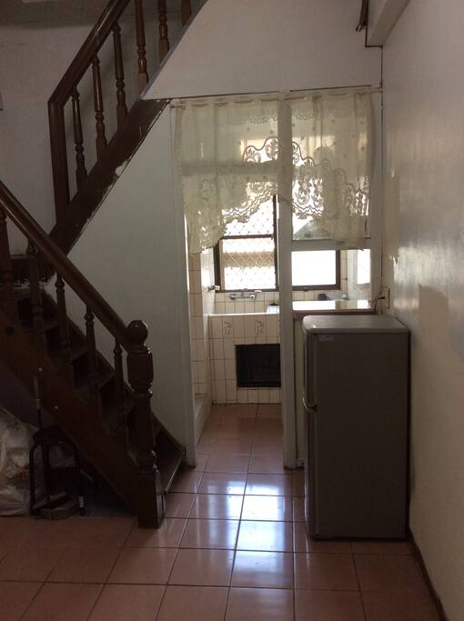 Kitchen, fridge 2 Fl & stairs to 3 Fl bedrooms