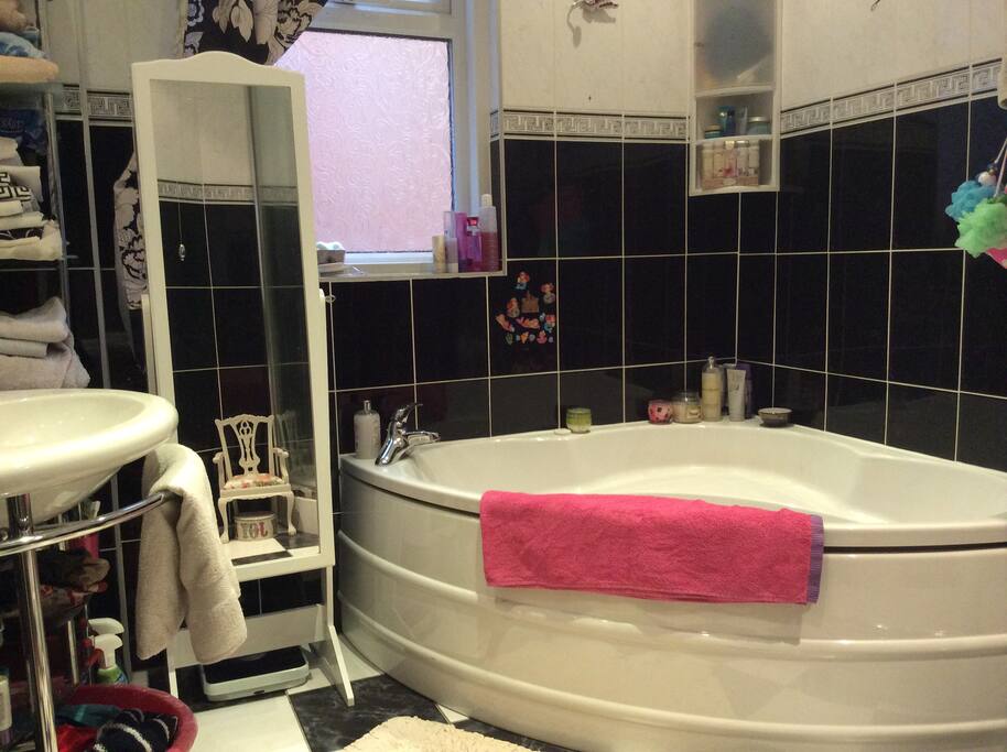Private bathroom with separate shower.