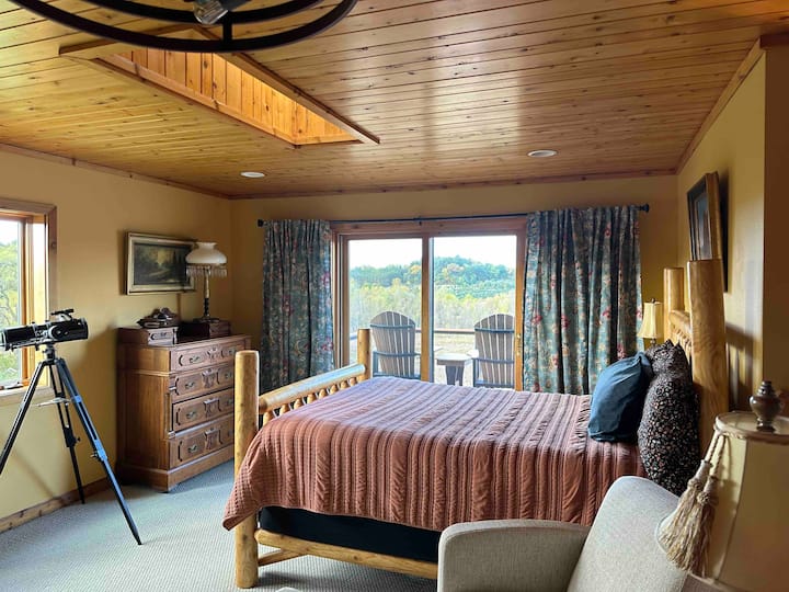 Third level loft space with queen bed and private balcony (not shown: powder room attached to this space too)