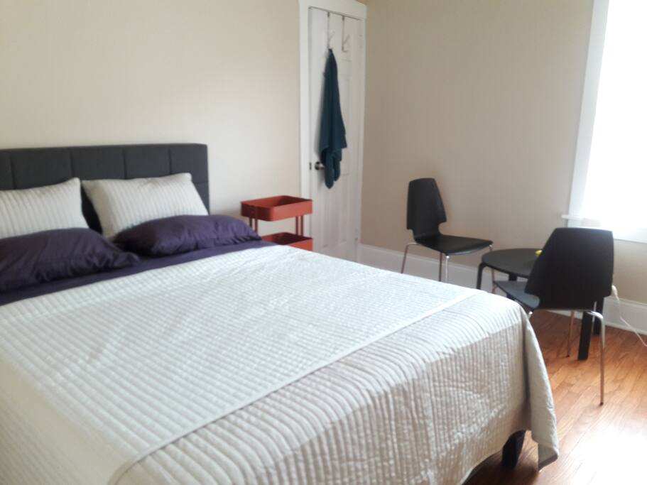 Another private bedroom with a sitting area