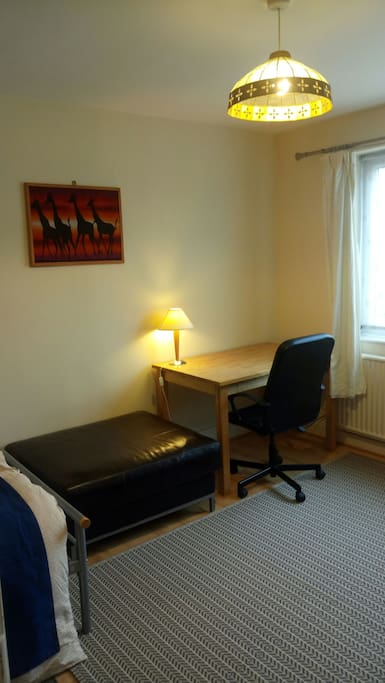 Large study desk with lamp, fast Wi-Fi