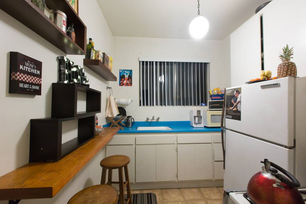 The kitchen has everything you need, cutlery, dishes, tea, coffee, treats