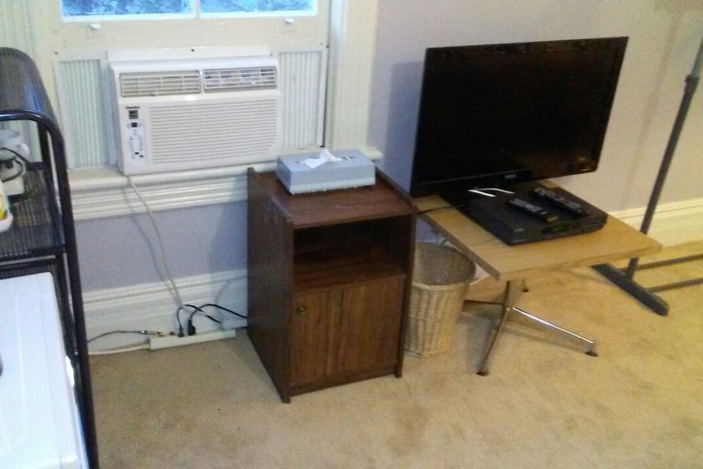 Air-conditioner, cable t.v.& sundry storage
