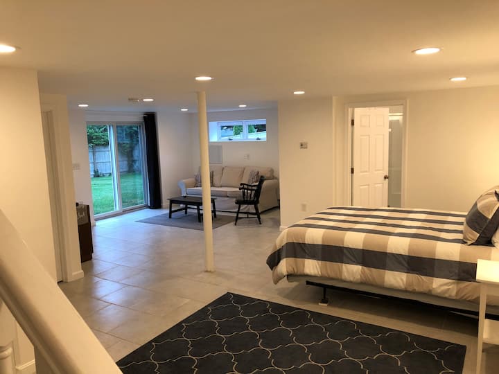 Downstairs with  slider to large fenced yard