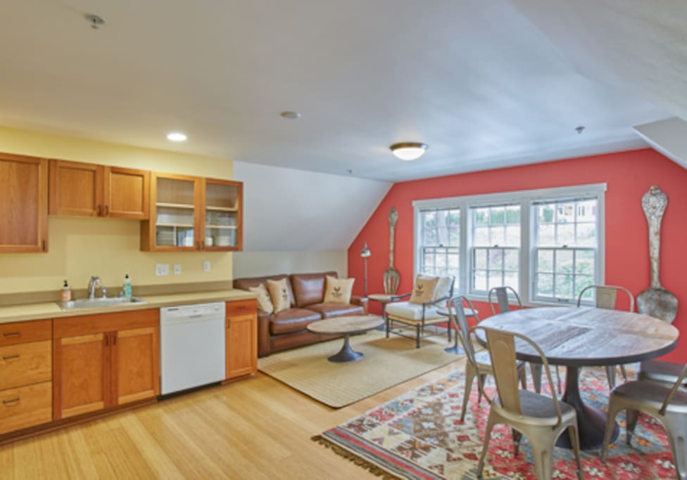 Common area with dining room table, couch & chair