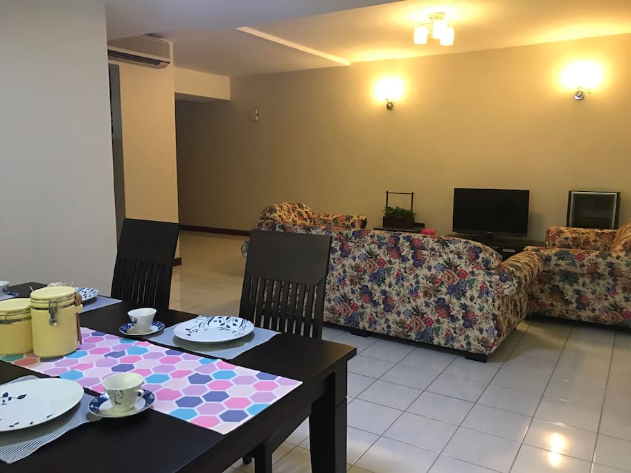 A comfortable dining area overlooking the living area.