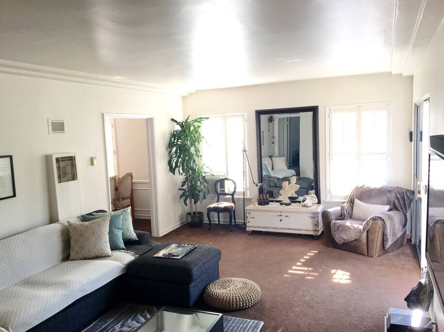 Spacious living room with separate dining room / Lots of light and seating space.