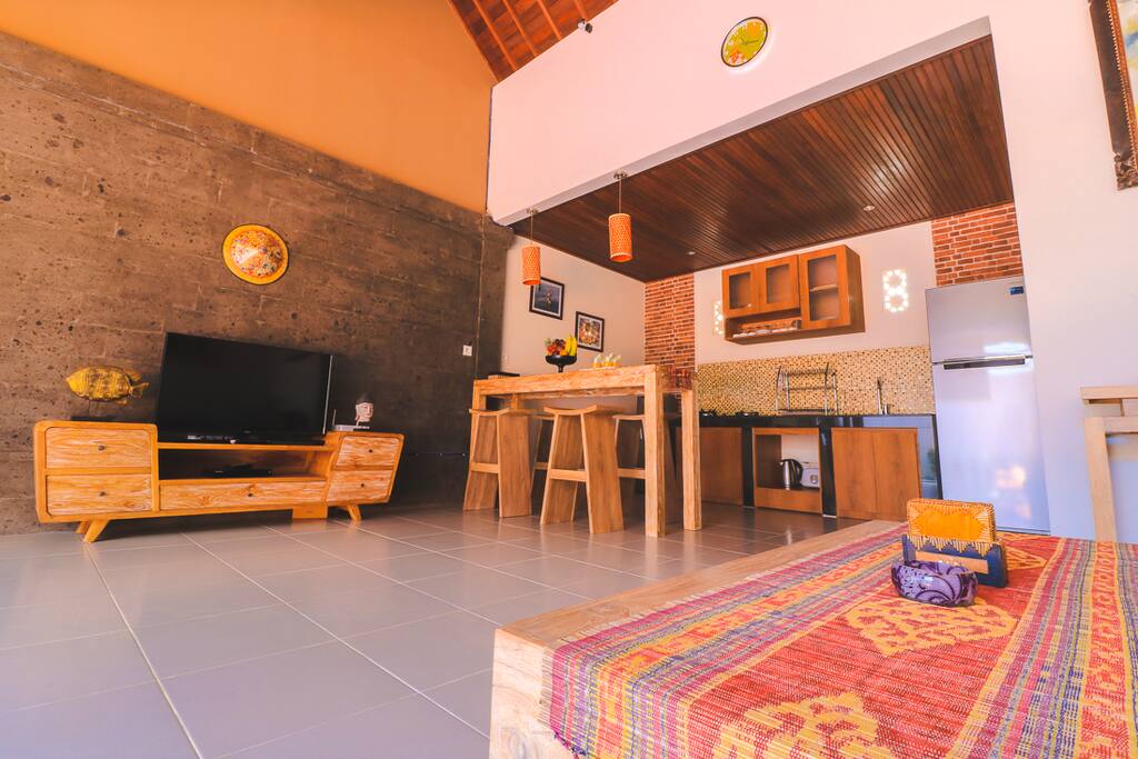 Living room, TV and dining and kitchen