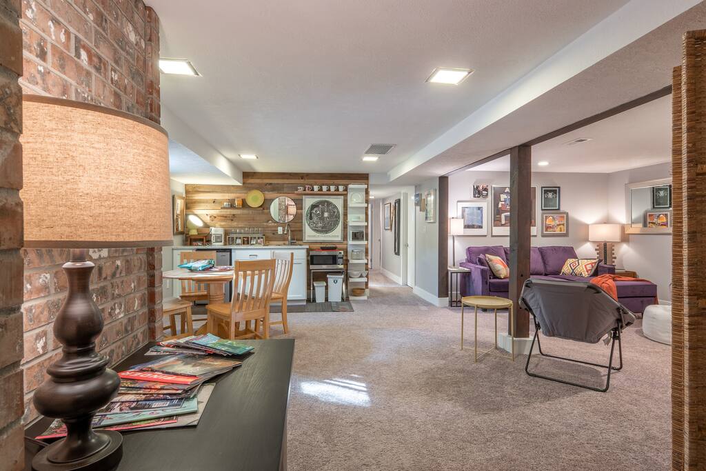 Handsome Brick, a wood wall and beams with plenty of art to enjoy.