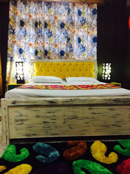 unwind on this beautiful distressed bed...
