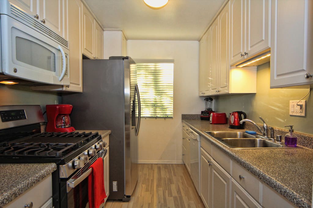 Fully stocked kitchen, ice and filtered water, BBQ stove top, utensils, spices