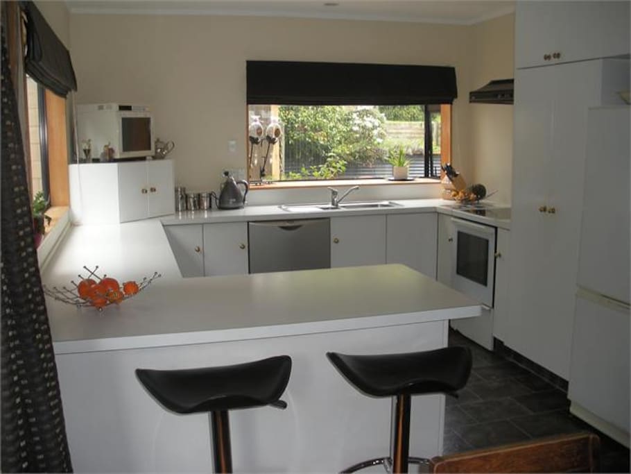Fully equipped modern kitchen for your use.
