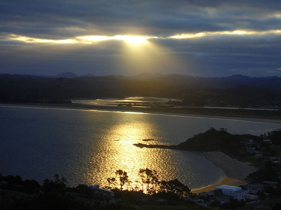 Sunset from caravan overlooking Wellington's bay and Ngunguru