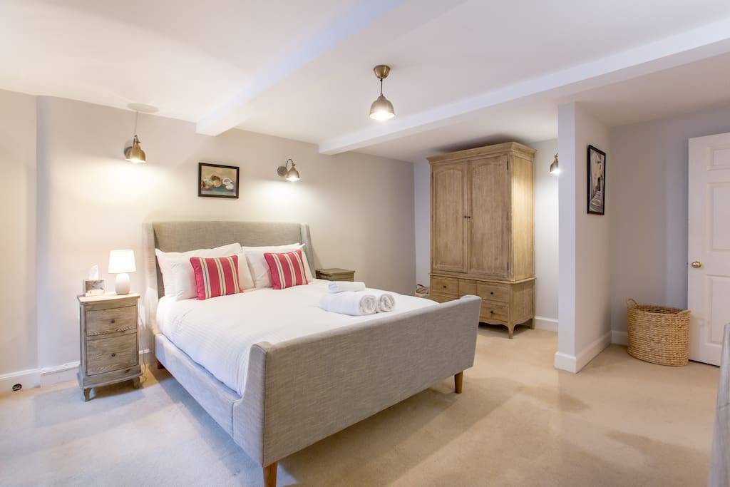 Master bedroom with Sleigh bed and luxury mattress