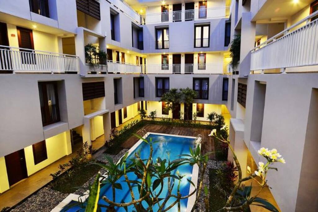 Garden and pool at night