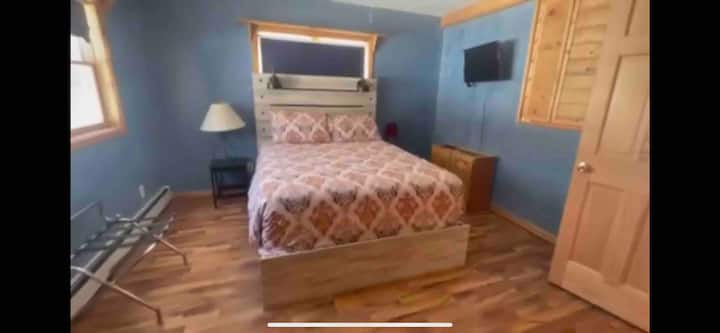 Upstairs master bedroom with queen bed