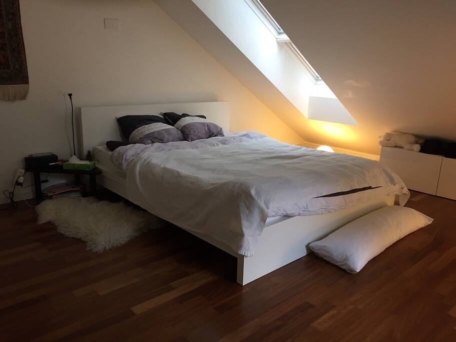 Bedroom with king-size bed and five-door wardrobe