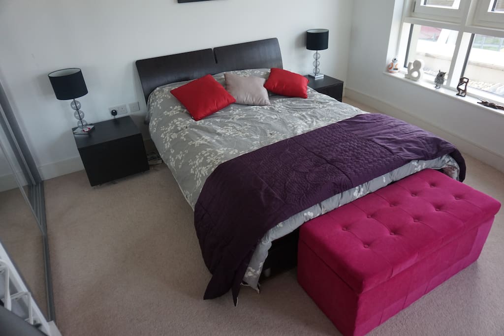 Large modern spacious bedroom with comfy double bed, and memory orthopedic mattress.