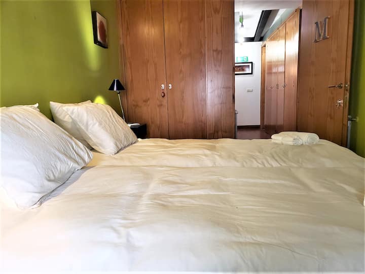 Dormitorio D dos camas individuales