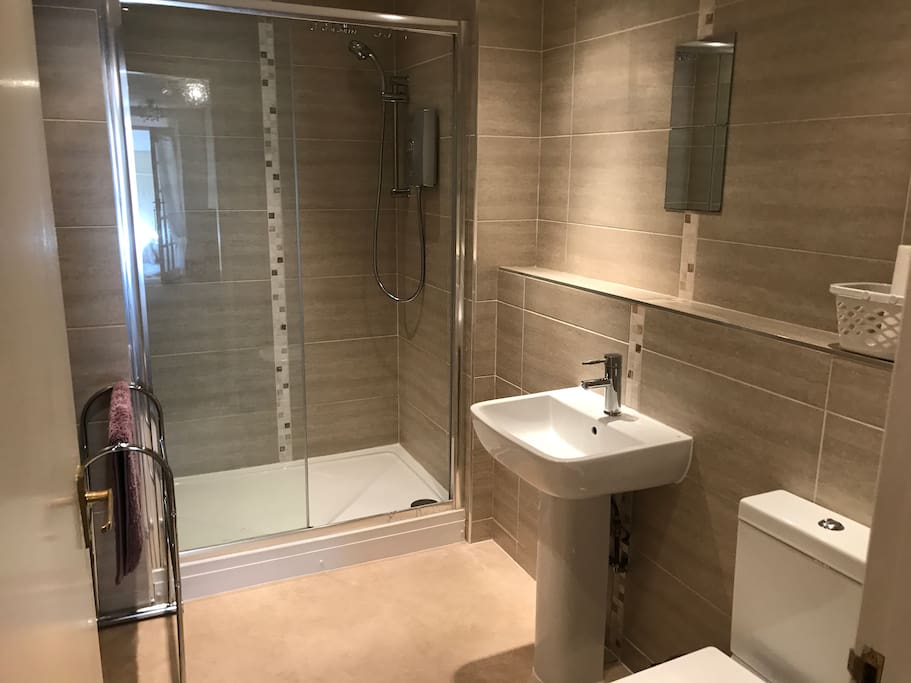 Large modern bathroom with walk in shower