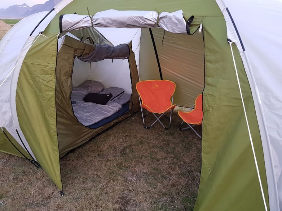 The tent and chairs to relax