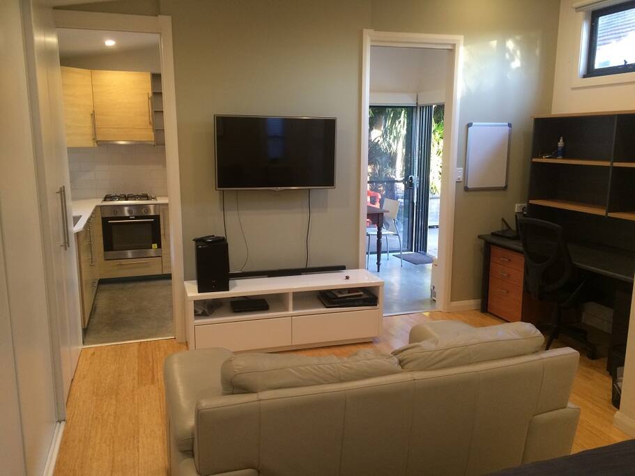 Leather lounge, TV, Wifi and study desk.