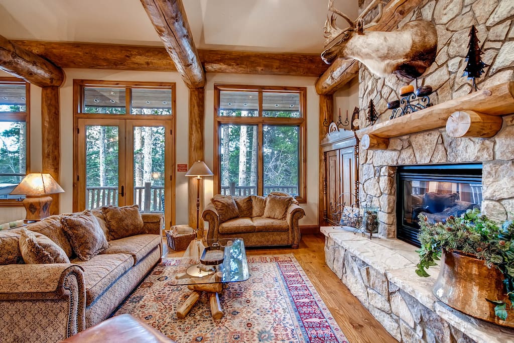 with Gas Fireplace and doors that lead out to deck with hot tub