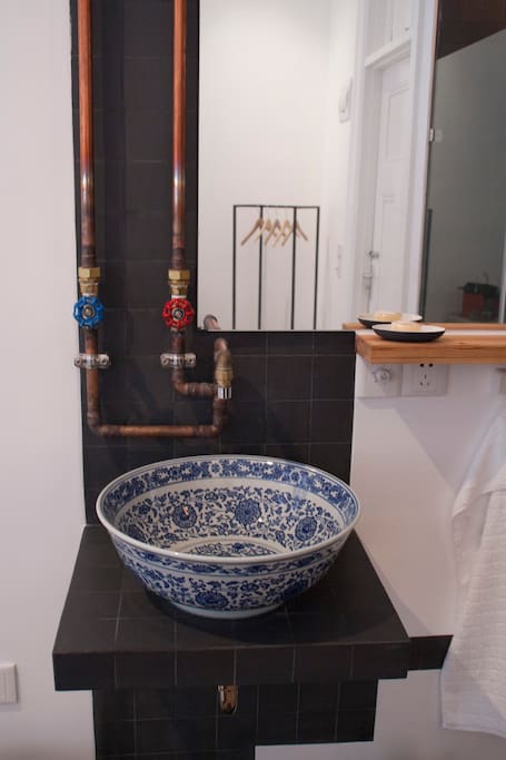 Rough, traditional and modern edge. Washing your hands in Shanghai.