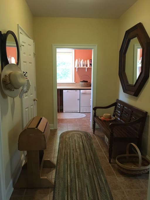Garage entrance into mudroom and laundry room