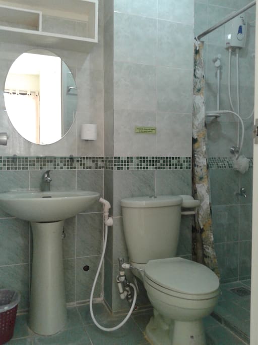 Toilet with hot and cold shower