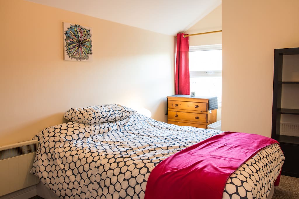 First bedroom with a double bed