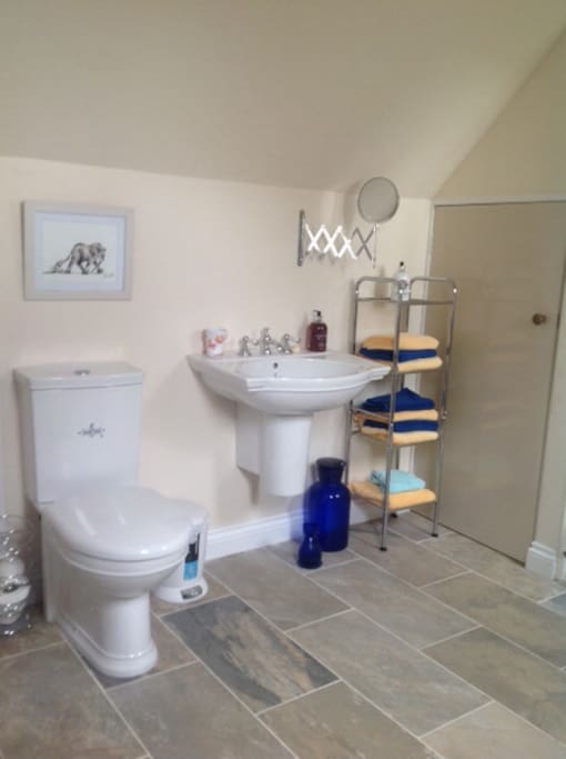 Brand new high spec bath and shower including fresh towels and hair dryer.