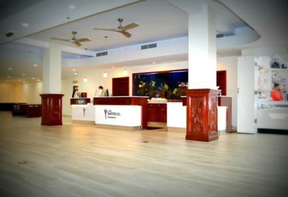 24 hour lobby with front desk and doorman