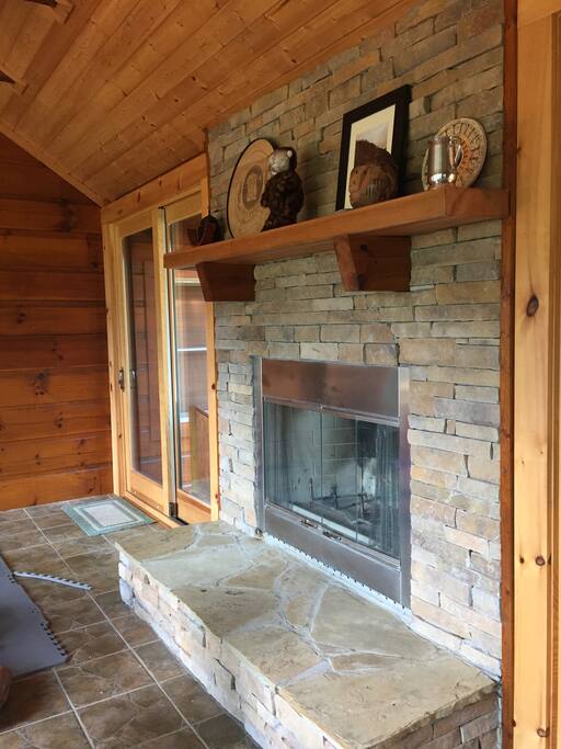Shared fire place in our screened in porch.