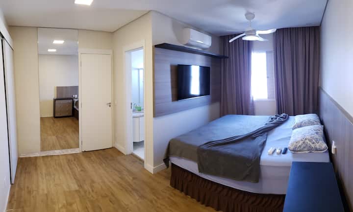 Master bedroom with king-size bed