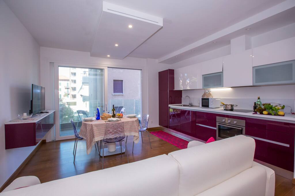 Living room with access to the balcony and sleeping sofa for 2