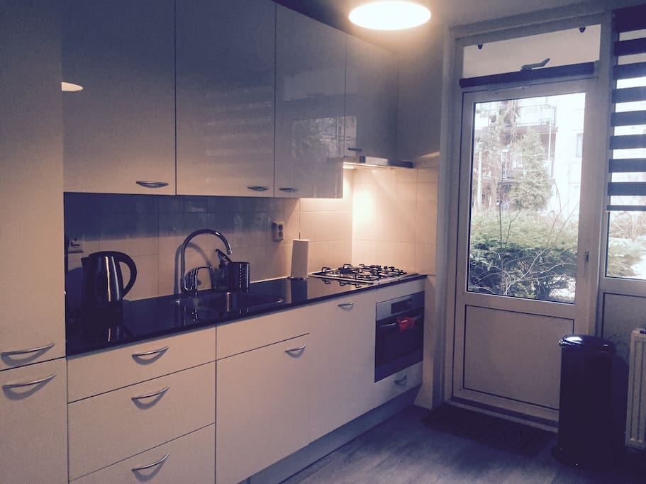 Kitchen with acces to the terrace/garden
