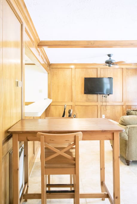 A tall table perfect for meals or work.