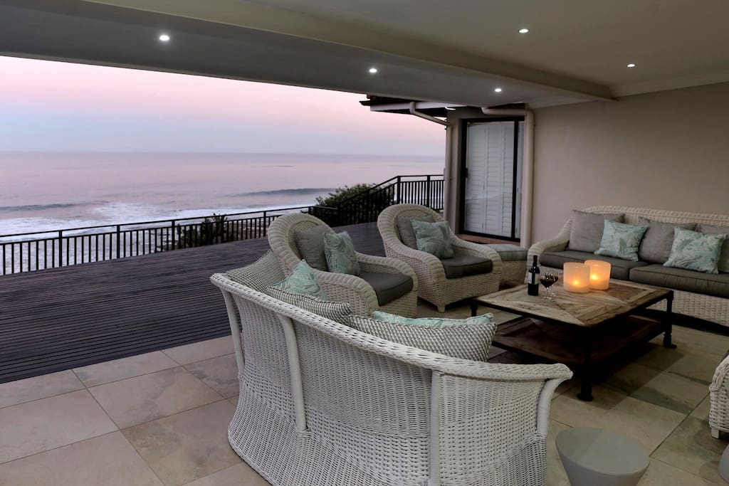 Covered patio and deck overlooking the ocean
