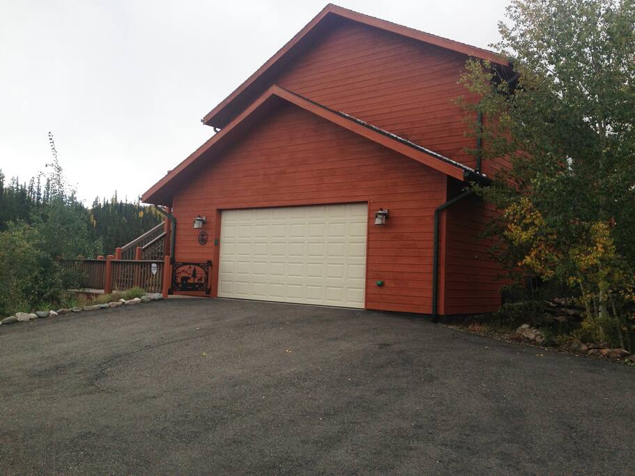 Large 2 car garage; driveway platform space to park 3-4 more vehicles.