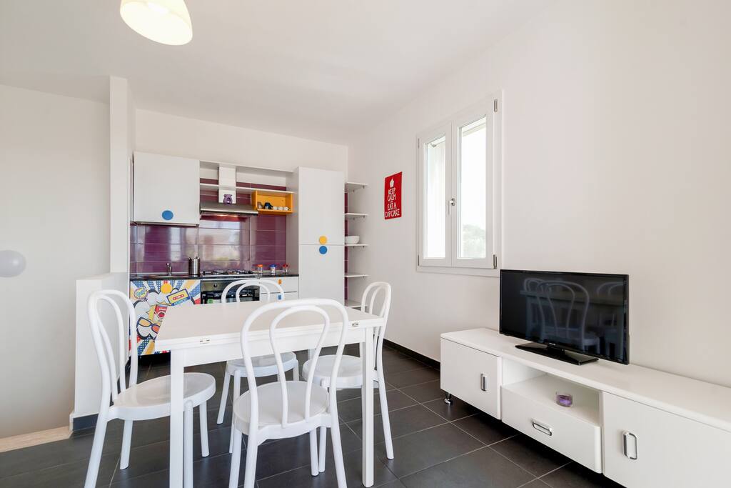 The Living room & the Kitchen - The dining table & The TV