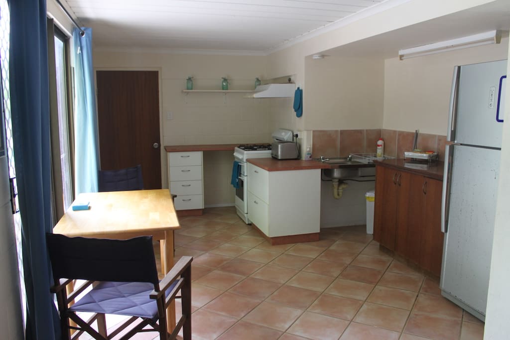 Kitchen, equipped to cook your own meals, fridge/freezer, oven and dining table.