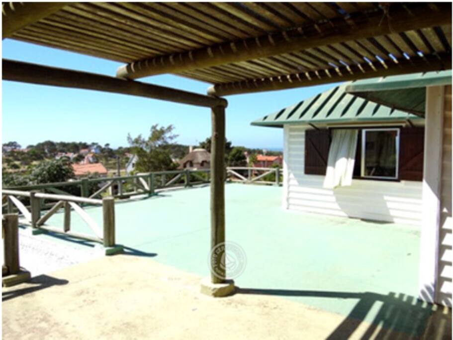 Pérgola con vista al mar. Casa
