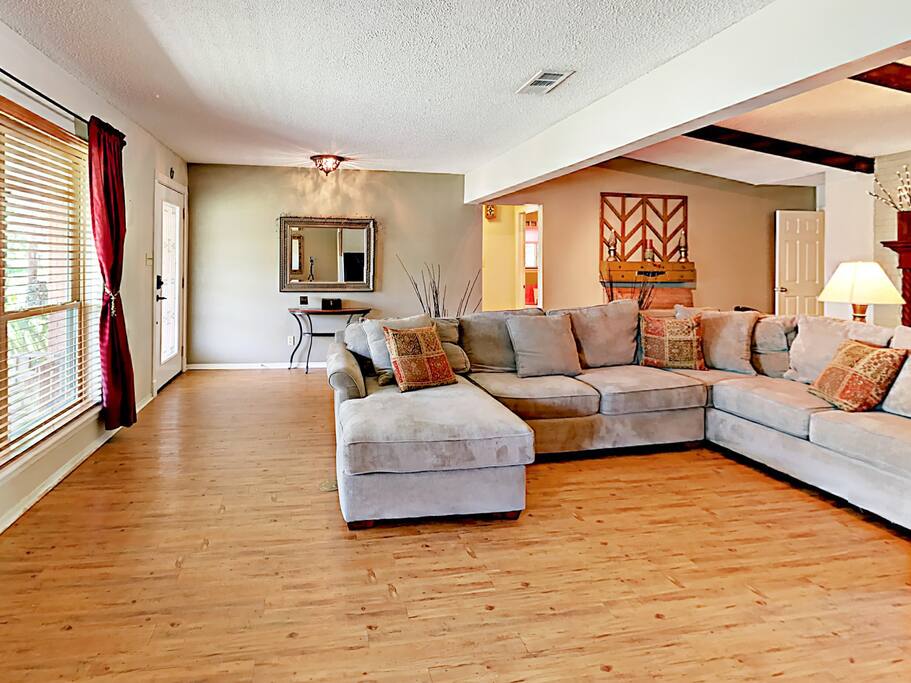 A comfortable couch offers seating in the living room.