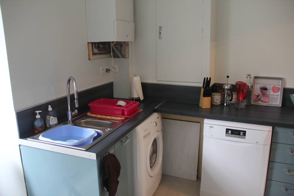 A view showing the dryer and dishwasher.